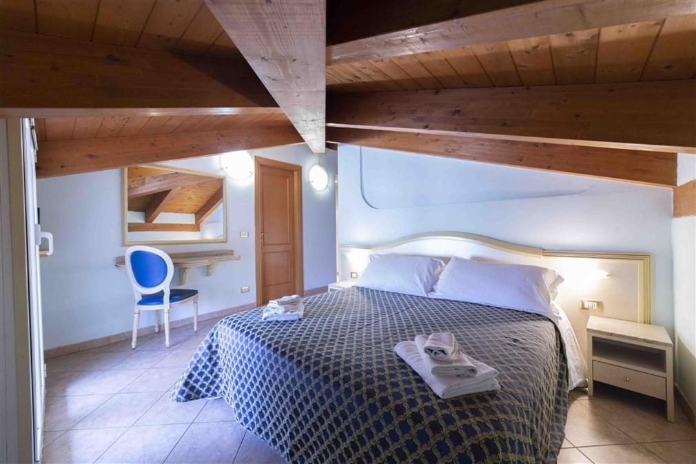 Residenza Melucci Aparthotel Rimini Bilik gambar